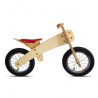 Bicicleta de madera sin pedales con sillín rojo